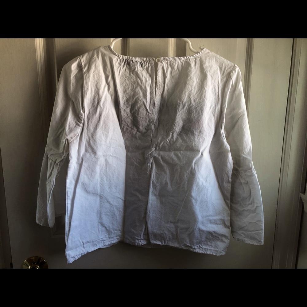 White with blue and red stripe, bell sleeves. Small, worn once, like new.